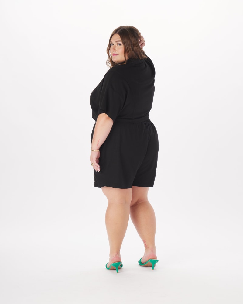 Front of a model wearing a size 1X Bobbie Linen Camp Shirt in White in Black by What Lo Wants. | dia_product_style_image_id:238014
